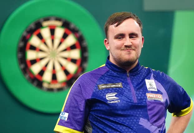 Luke Littler celebrates victory in the semi-final against Rob Cross on day 15 of the Paddy Power World Darts Championship at Alexandra Palace, London. (Photo by Zac Goodwin/PA Wire)