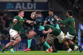 Ireland's Stuart McCloskey (centre) in action against South Africa