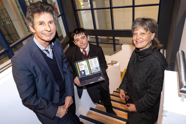 Journalist Mark Devenport with Finlay Foster, year 10 Belfast Boys' Model School and Marie O'Donoghue, Creative Schools Partnership Programme Manager, Education Authority. Pic: Arts Council NI/PA Wire
