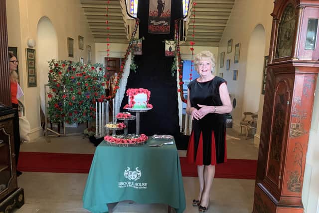 Joan Clements BEM with specially commissioned cake for the Poppy Appeal Launch