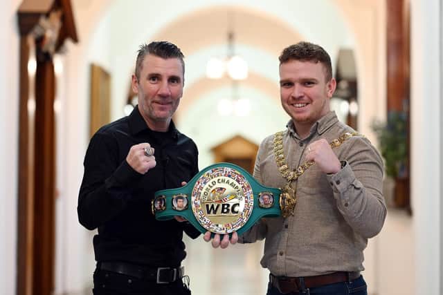 Former WBC batamweight champion Wayne McCullough presented a replica of his title belt to Lord Mayor Ryan Murphy for the people of Belfast during a ceremony at Belfast City Hall. Picture: Michael Cooper