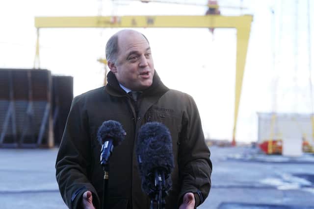 Defence Secretary Ben Wallace says that controversial legislation to deal with the legacy of the Northern Ireland Troubles will end the current “merry-go-round” of court cases. He is pictured here speaking to the media during a visit to Harland & Wolff shipyard factory in Belfast today, 18 January.