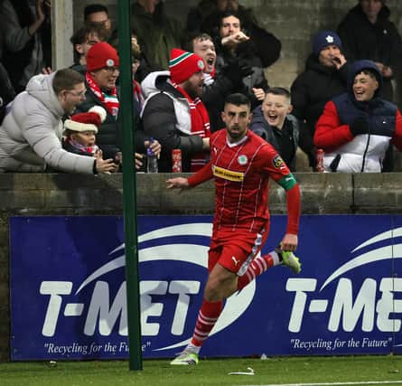Cliftonville fans enjoy Joe Gormley's goal in a 4-1 away win over Dungannon Swifts at Stangmore Park. (Photo by David Maginnis/Pacemaker Press)