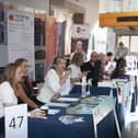 Some of the stalls and exhibitors at a previous Jobs Fair at the Millennium Forum