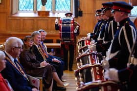 Guests get an up-close view of a drumming demonstration at the Queen’s University event. Photo by Graham Baalham-Curry