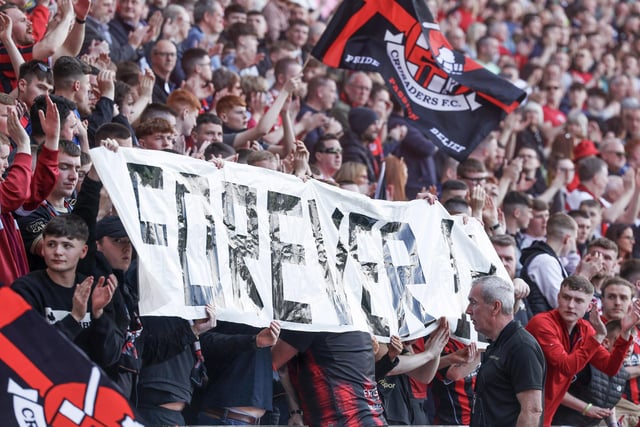 A minutes of applause was marked to remember Crusaders’ player Kaylee Black who passed away. Crusaders fans hold up a banner in Kaylee's memory at Windsor Park