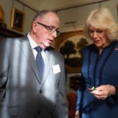 Queen Camilla talks with Mark Young, a production manager at The Poppy Factory during a celebration at Clarence House, central London, marking the centenary of The Poppy Factory, which was founded  in the aftermath of the First World War