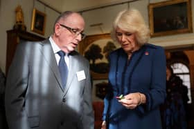 Queen Camilla talks with Mark Young, a production manager at The Poppy Factory during a celebration at Clarence House, central London, marking the centenary of The Poppy Factory, which was founded  in the aftermath of the First World War