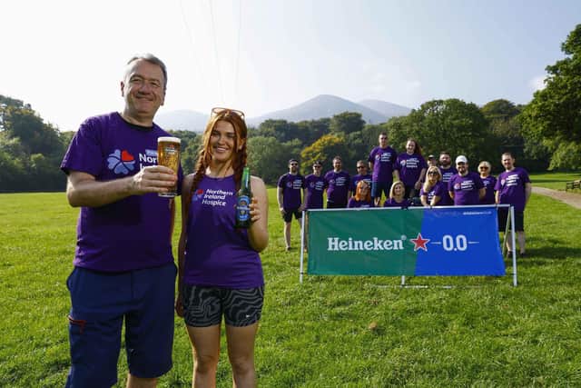 Ciaran Meyler and Chloe Wright were part of a 15-strong team from Craigavon-based United Wines to set a new record for serving the highest pint of Heineken in Northern Ireland, in aid of the Northern Ireland Hospice. Staff from the leading drinks distributor completed the challenge to serve a pint of non-alcoholic Heineken 0.0 at the top of Slieve Donard mountain, raising £2,500 in the process, which was match funded by United Wines to provide a grand total of £5,000 for the charity which provides specialist palliative care to 4,000 patients every year