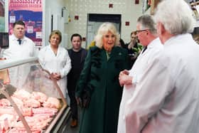 Her Majesty The Queen visits Coffey’s Butchers on the Lisburn Road in Belfast, where she was gifted beef sausages, vegetable roll and Tayto cheese and onion crisps. Photo by Jonathan Porter/Press Eye