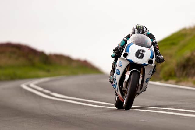 Michael Dunlop on his way to victory in the RST Classic Superbike race on the Team Classic Suzuki at the Manx Grand Prix on Monday.