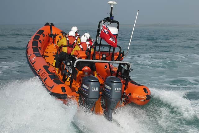 Portaferry Atlantic 85 inshore lifeboat Blue Peter V. Lifeboat heading away from the camera.