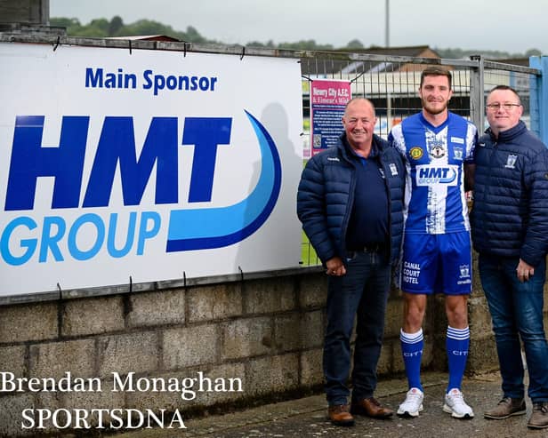 Chairman Martin McLoughlin with new signing Lee Newell, Vice Chairman Gary Wilson and Manager Gary Boyle. Picture: Brendan Monaghan Photography