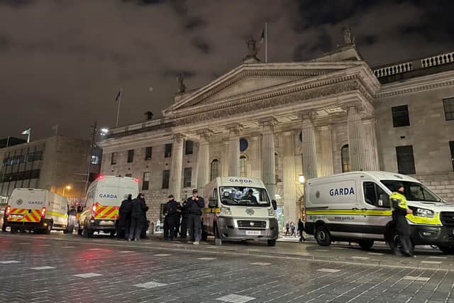 Garda outside the General Post Office on O'Connell Street in Dublin on Friday evening in the aftermath of violent scenes in the city centre the previous evening. The unrest came after an attack on Parnell Square East where five people were injured, including three young children. Photo: David Young/PA Wire