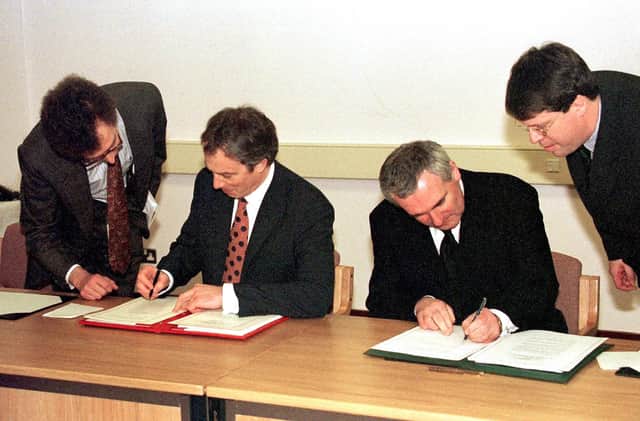 UK Prime Minister, Tony Blair (Left) and Irish Taoiseach Bertie Ahern signing the April 10 1998 agreement. This 'hand of history' thing seemed like it might mean something.  Photo: Dan Chung/PA Wire