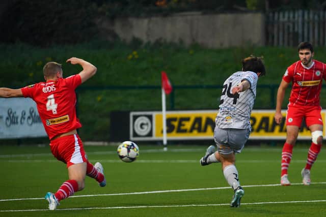 Newry City winger Lorcan Forde gets a shot away in the narrow defeat to Cliftonville at Solitude