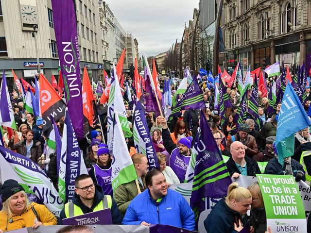 Education and health sector workers attending a rally Belfast earlier this year. A number of unions have today stated that further industrial action is likely this year if public sector pay awards for workers in England are not matched in Northern Ireland