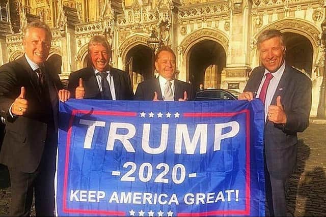 Paul Girvan (right) with fellow Trump backers in 2020
