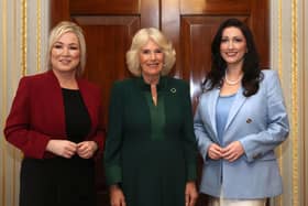 Queen Camilla (centre) with First Minister Michelle O'Neill (left) and Deputy First Minister Emma Little-Pengelly (right) as  she attends an event hosted by the Queen's Reading Room to mark World Poetry Day at Hillsborough Castle in Belfast, during her two-day official visit to Northern Ireland. Picture date: Thursday March 21, 2024. PA Photo.