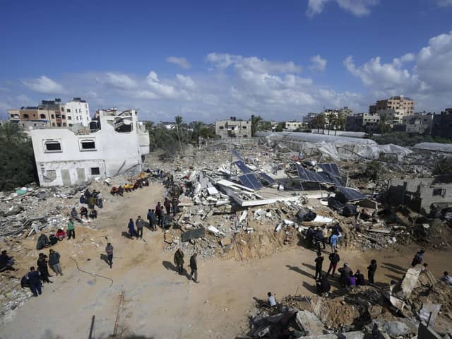 The aftermath of an Israeli bombardment of the Gaza Strip on Monday. The Israeli military has to eliminate the Hamas leadership and to destroy the infrastructure of terror built by Hamas under Gaza (AP Photo/Adel Hana)