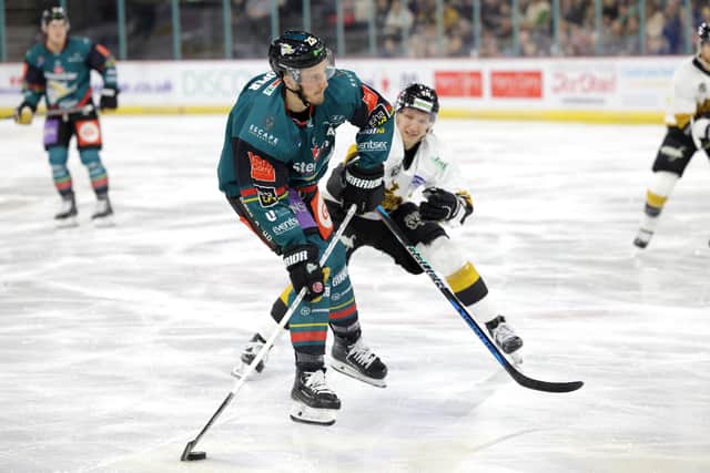 Belfast Giants’ Mark Cooper with Nottingham Panthers' Niko Lahtinen during Sunday’s Elite Ice Hockey League game at the SSE Arena, Belfast.   Photo by William Cherry/Presseye