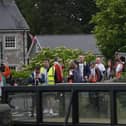 The pro-Palestinian march under protection of officers from the Police Service of Northern Ireland (PSNI) passes closes the village of Scarva, Co Down as it travels from Lurgan to Newry