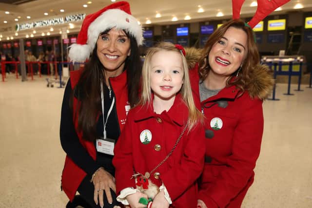 Fiona Williamson, General Manager with NI Children to Lapland and Days to Remember Trust is at the airport ahead of flying to Lapland with Lindie Flinn and mum Cathy Flinn. Pic by Declan Roughan dvrphoto@me.com