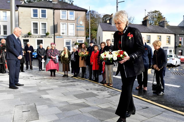 Margaret Veitch whose parents William and Angns Mullan were killed in the 1987 Remembrance Sunday bomb laying a wreath to mark the 35th anniversary of the Remembrance Sunday bombing.