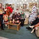 The Cast of Give My Head Peace on set during filming for their Christmas special