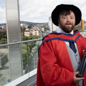 Actor James Martin with his honorary doctorate from Ulster University