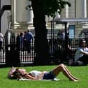 People enjoy the grounds of Belfast city hall. Picture By: Arthur Allison /Pacemaker Press.