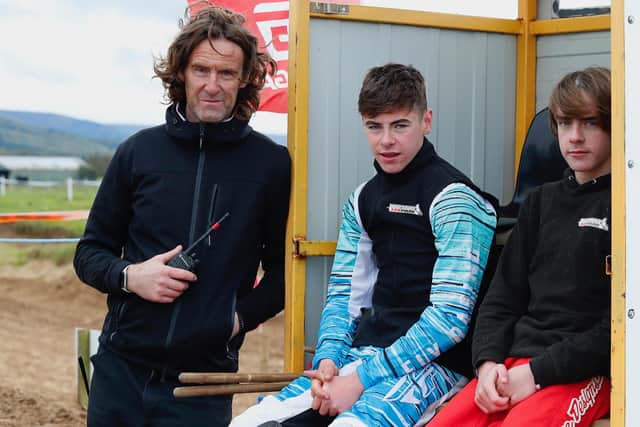 Philip Mccullough pictured with his sons Cole and Robbie at Magilligan. Robbie won the pit bike class.