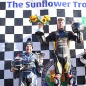 Richard Kerr on the podium after winning the Sunflower Trophy race on the AMD Motorsport Honda with runner-up Alastair Seeley (left) and Jason Lynn. Picture: Stephen Davison