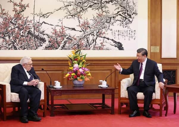 Chinese President Xi Jinping and Henry Kissinger, former U.S. secretary of state, attend a meeting at the Diaoyutai State Guesthouse in Beijing, China July 20, 2023. China Daily via REUTERS