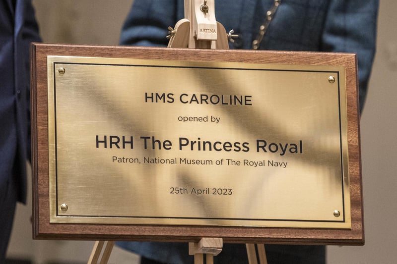The plaque unveiled by the Princess Royal during the reopening of HMS Caroline and the Pumphouse at Alexandra Dock, in the Titanic Quarter, Belfast, following an extended period of closure due to the covid pandemic. Picture date: Tuesday April 25, 2023. PA Photo. Photo credit should read: Liam McBurney/PA Wire