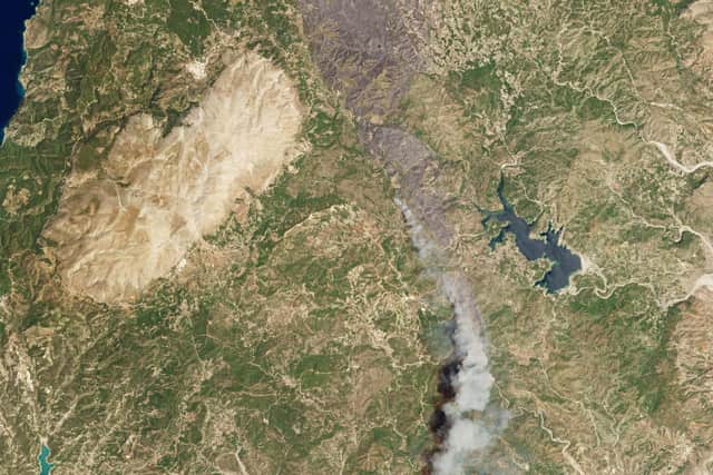 Satellite imagery issued by Planet Labs PBC of wildfires on the island of Rhodes in Greece. As many as 10,000 Britons are estimated to be on the popular Greek island, part of which has been ravaged by the blazes, forcing many to sleep in schools, airports and sports centres. Issue date: Monday July 24, 2023. Photo credit should read: Planet Labs PBC/PA Wire