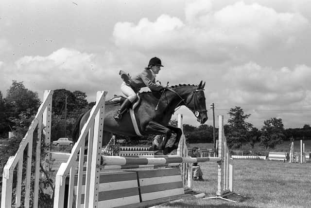 Pictured in July 1980 at the Killinchy Show is Anna Erskine on Windy on her way to a clear round. Picture: News Letter archives/Darryl Armitage