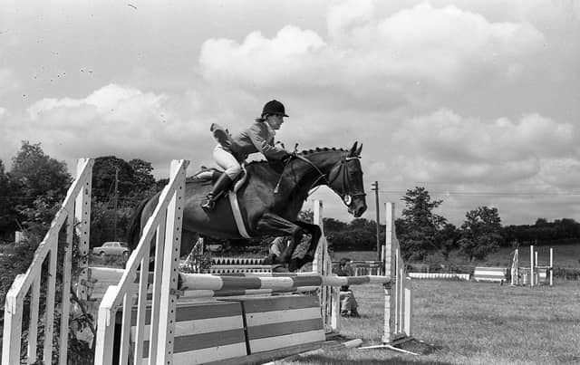 Pictured in July 1980 at the Killinchy Show is Anna Erskine on Windy on her way to a clear round. Picture: News Letter archives/Darryl Armitage