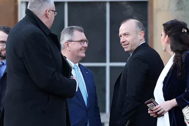 Secretary of State for Northern Ireland Chris Heaton-Harris makes his way back into Hillsborough Castle after talking to the media and passes DUP leader Sir Jeffrey Donaldson. Picture by Jonathan Porter/PressEye