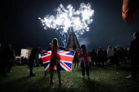 Watching the fireworks at the Corcrain Redmanville Bonfire in Portadown on Monday night. Photo by Kelvin Boyes  / Press Eye