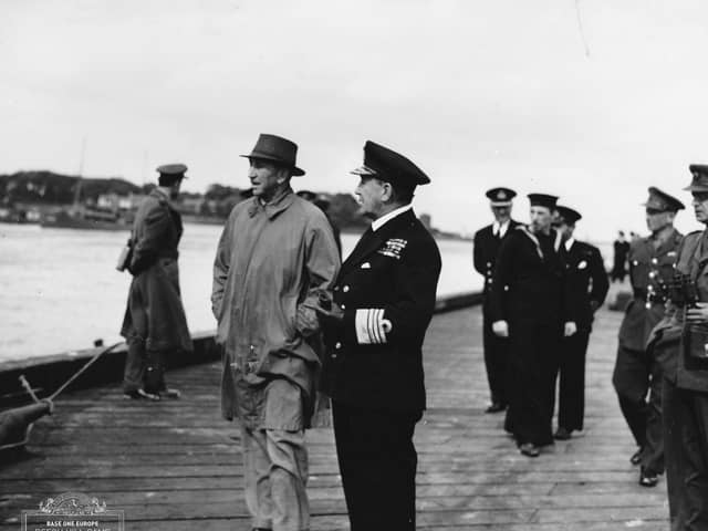 Surrender of 8 German U-boats at Derry. Admiral Horton and Sir Basil Brooke, Prime Minister of Northern Ireland at the time, examine the captured subs on 14 May 1945.
