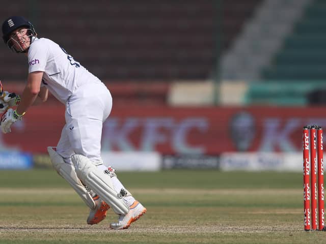 England's Harry Brook edges the ball towards the boundary during Day Two of the Third Test between Pakistan and England at Karachi National Stadium on Sunday. (Photo by Matthew Lewis/Getty Images)