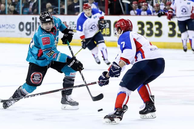 Belfast Giants' Patrick Dwyer with Arlan Kokshetau's Stanislav Borovikov during the 'winner-takes-all' IIHF Continental Cup Final game at the SSE Area, Belfast in January 2019.   Photo by William Cherry/Presseye
