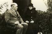 Sam Henry with Mrs Brownlow, a traditional singer, taking down a song Photo courtesy of Coleraine Museum