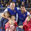 Stephen Lowry with brother Philip and their families after Limavady United beat Linfield in the Irish Cup last season. (Photo by Desmond Loughery/Pacemaker Press)