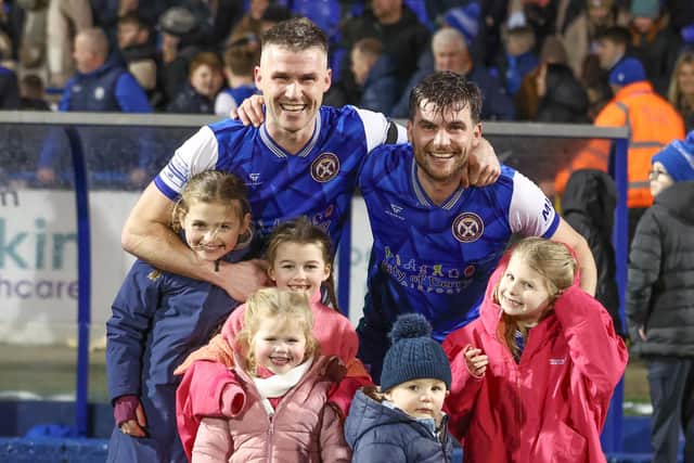 Stephen Lowry with brother Philip and their families after Limavady United beat Linfield in the Irish Cup last season. (Photo by Desmond Loughery/Pacemaker Press)