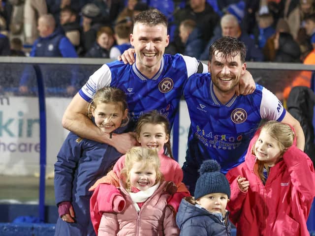 Stephen Lowry with brother Philip and their families after Limavady United beat Linfield in the Irish Cup last season. (Photo by Desmond Loughery/Pacemaker Press)