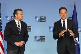 United States Defense Secretary Pete Hegseth, left, and NATO Secretary General Mark Rutte participate in a media conference during a meeting of NATO defense ministers at NATO headquarters in Brussels, Thursday, June 18, 2026. (AP Photo/Virginia Mayo)