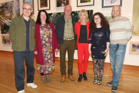 Secret Artists Colin Murphy, Alice Wyatt, Thomas McNeill, Amy Wyatt and Stephen Greer with production director Hilary Fennell in the Ulster Museum for the opening night of the RUA show