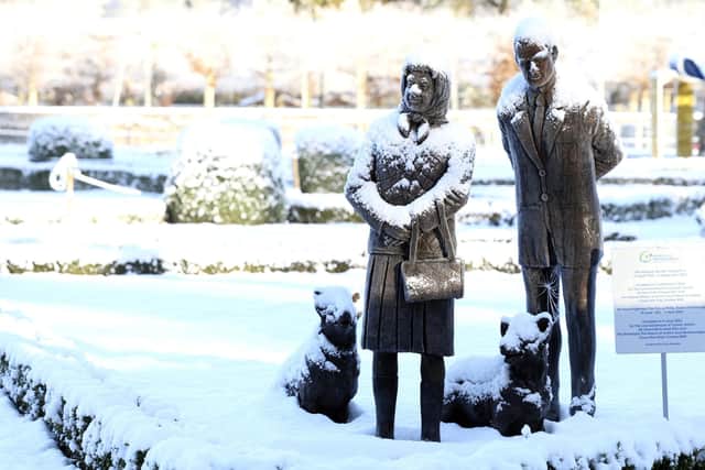 Further snow fall this morning at Antrim Castle Gardens, the Queen’s statue god a light dusting too Picture Stephen Davison/Pacemaker Press